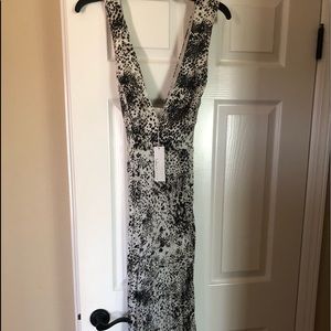 Lulu’s dress. Never worn. Beautiful material